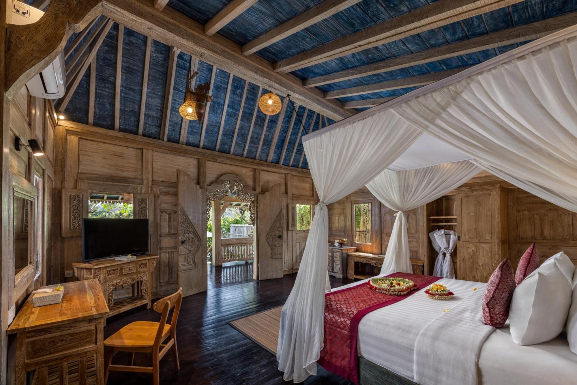 Wooden Ganeca By Pramana Villa Ubud